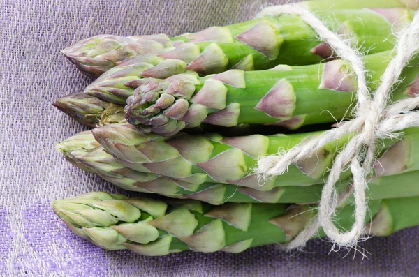 Asparagus on tablecloth — Stock Photo, Image