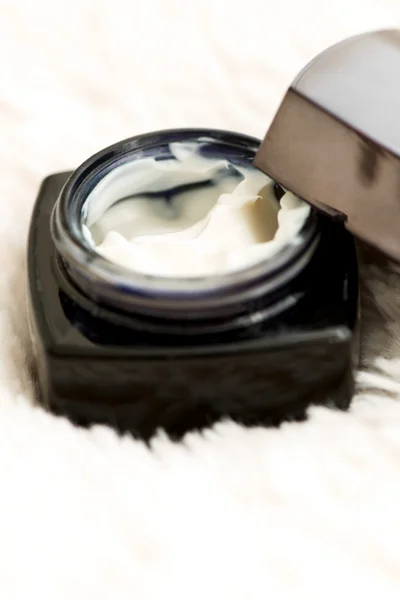 Cosmetic cream in jar close up shallow DOF — Stock Photo, Image