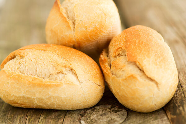 Homemade bread on wooden table close up