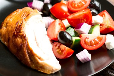 Roasted chicken breast with vegetables clipart