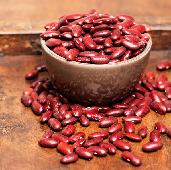 Bowl with raw red beans — Stock Photo, Image