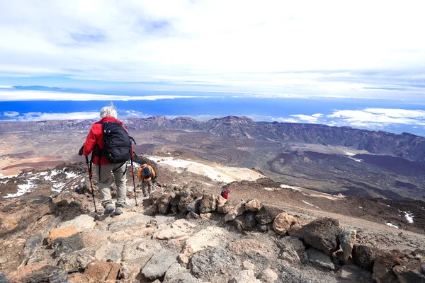 Man at mountain landscape near volcano Teide descending — Stock Photo, Image