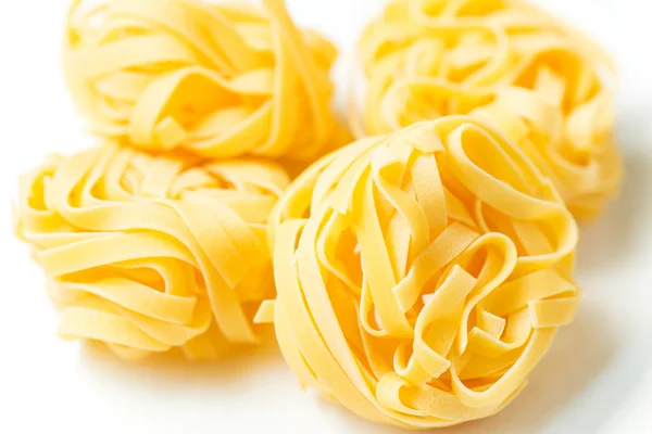 Macarrão seco tagliatelle — Fotografia de Stock