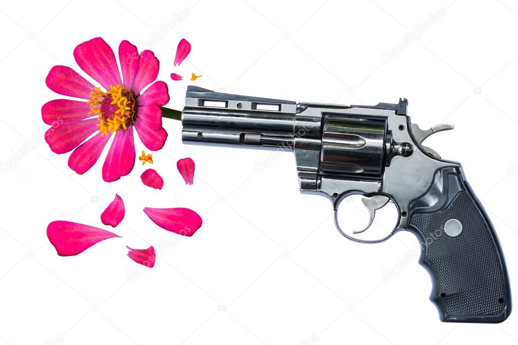 Pink flower hanging from the gun barrel