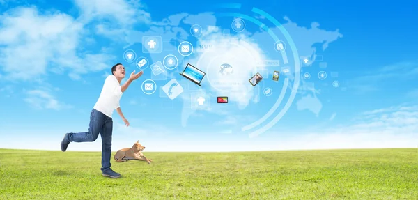 Man juggling with modern technology — Stock Photo, Image