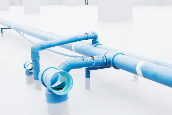 Blue water supply pipeline — Stock Photo, Image