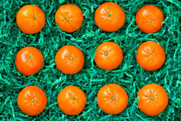 Frische Mandarinen sorgfältig verpackt, Orangen Hintergrund — Stockfoto