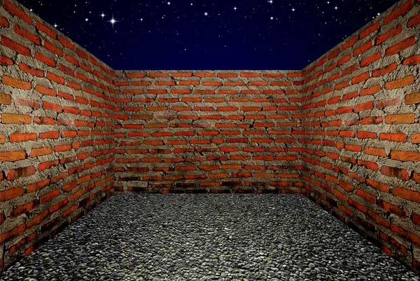 Room with a brick wall, the Night sky background — Stock Photo, Image