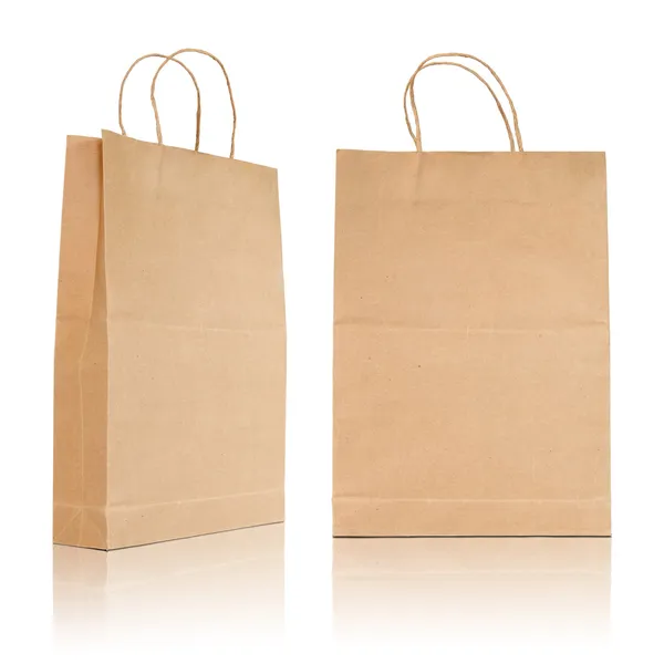 Brown paper bag on reflect floor and white background — Stock Photo, Image
