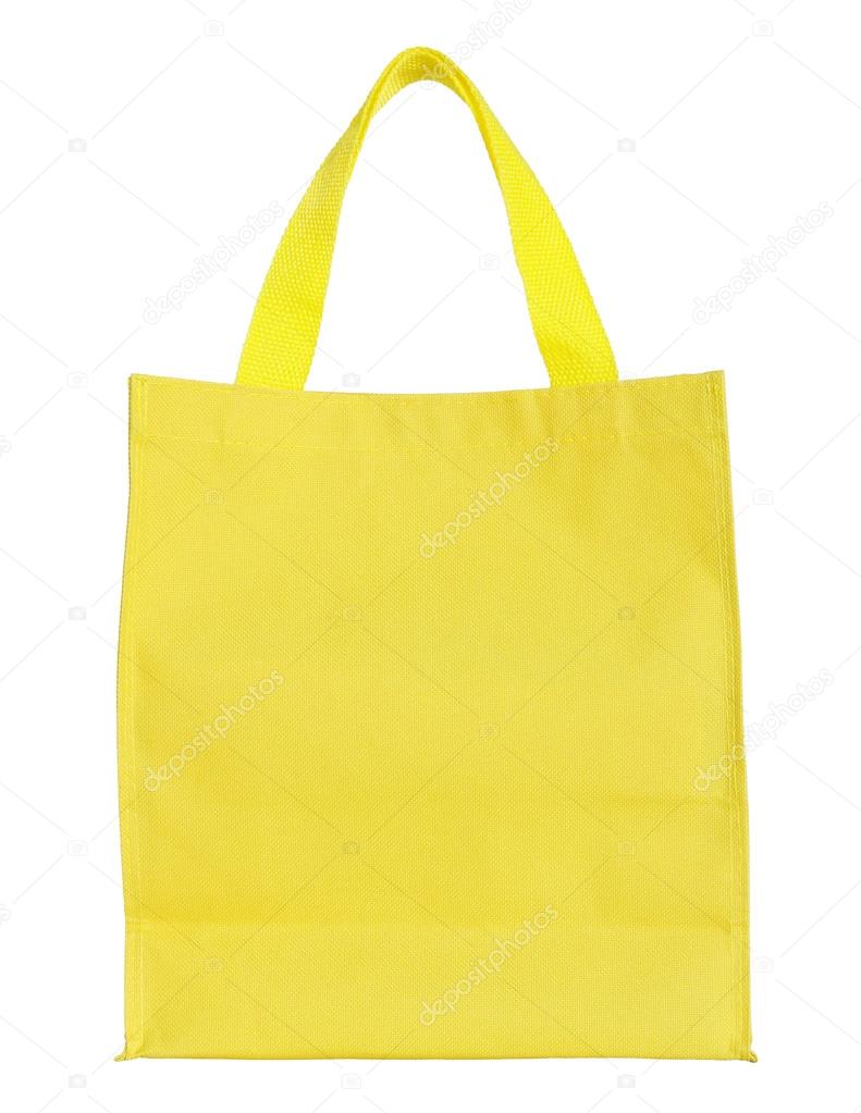 yellow canvas shopping bag isolated on white background with cli