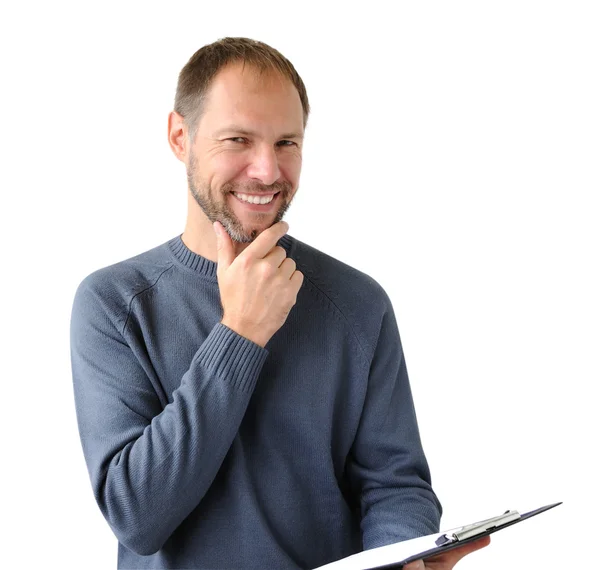 Homem sorridente em cinza com um comprimido isolado em branco — Fotografia de Stock