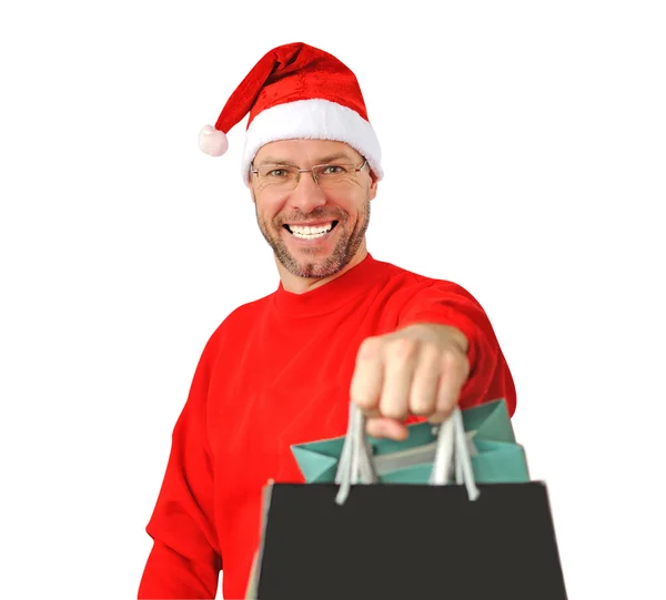 Sorridente uomo di Natale indossa un cappello di Babbo Natale isolato sul bianco — Foto Stock