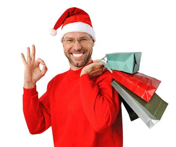 मुस्कुराते क्रिसमस आदमी एक सांता टोपी पहने हुए सफेद पर अलग — स्टॉक फ़ोटो, इमेज