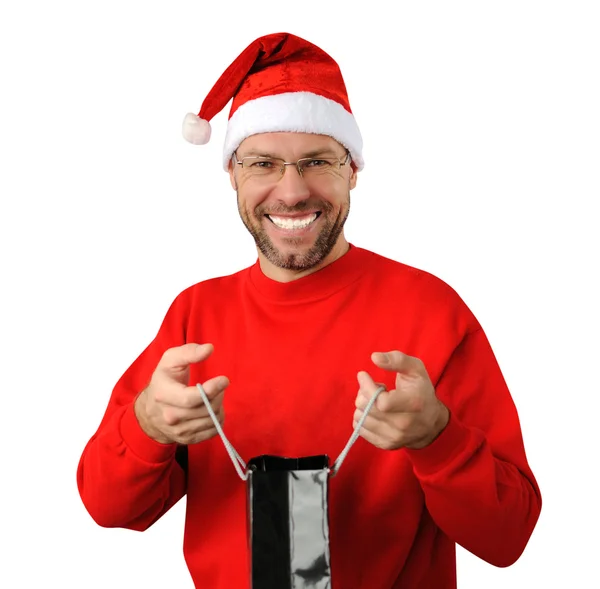 Sorridente uomo di Natale indossa un cappello di Babbo Natale isolato sul bianco — Foto Stock