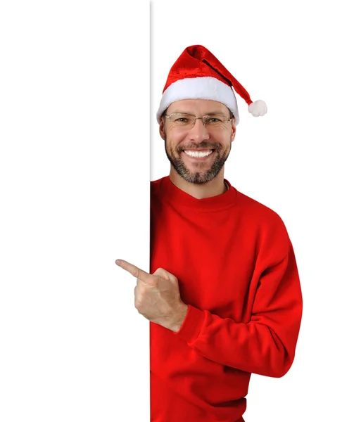 Sorridente uomo di Natale indossa un cappello di Babbo Natale isolato sul bianco — Foto Stock