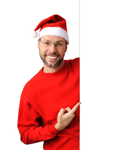 Sorridente uomo di Natale indossa un cappello di Babbo Natale isolato sul bianco — Foto Stock