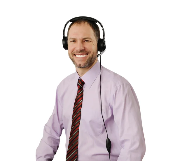 Homem sorridente com fone de ouvido isolado no fundo branco — Fotografia de Stock