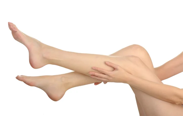 Mulheres bonitas pernas isoladas no fundo branco — Fotografia de Stock