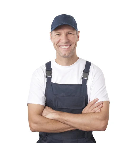 Retrato de trabalhador sorridente em uniforme azul isolado em bac branco — Fotografia de Stock