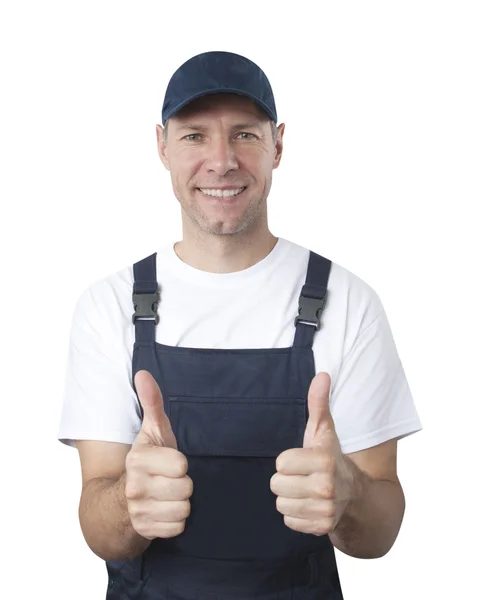 Portret van lachende werknemer in blauwe uniform geïsoleerd op witte bac — Stockfoto