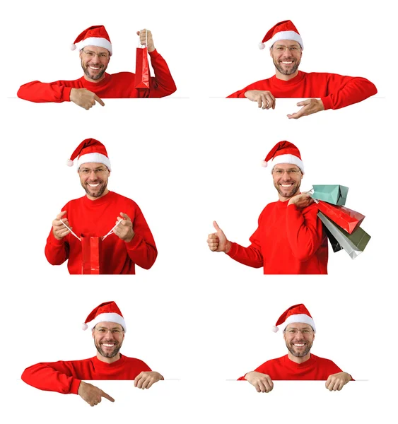 Conjunto de homem de Natal sorridente vestindo um chapéu de Papai Noel isolado no fundo branco — Fotografia de Stock