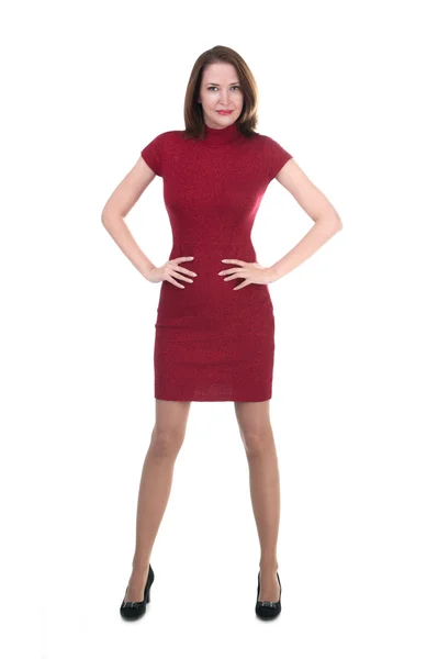 Žena v malé červené šaty na bílém pozadí — Stock fotografie