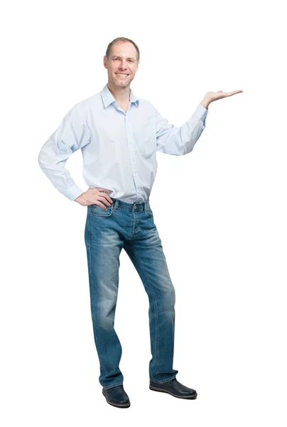 Homem sorridente em camisa azul e jeanse isolado no backgroun branco — Fotografia de Stock