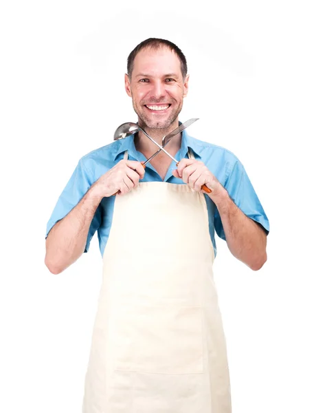 Glimlachende man koken in schort geïsoleerd op witte achtergrond — Stockfoto