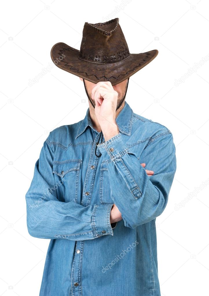 Portrait of Man with cowboy hat isolated on a white background
