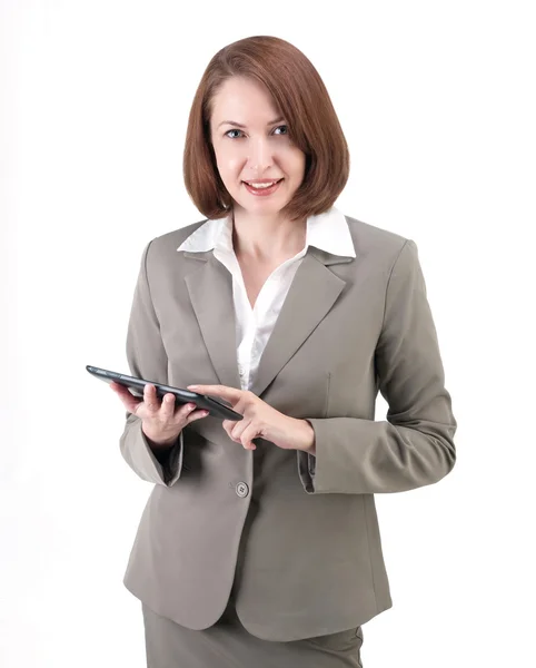 Mooie zakenvrouw in grijs pak met tablet geïsoleerd op wit — Stockfoto