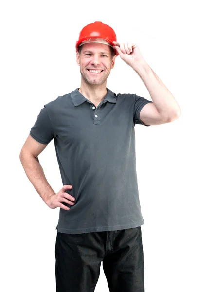 Trabalhador homem em um capacete vermelho isolado no fundo branco — Fotografia de Stock