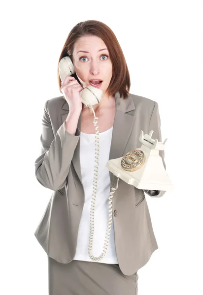 Engraçado mulher de negócios com telefone vintage isolado em branco ba — Fotografia de Stock