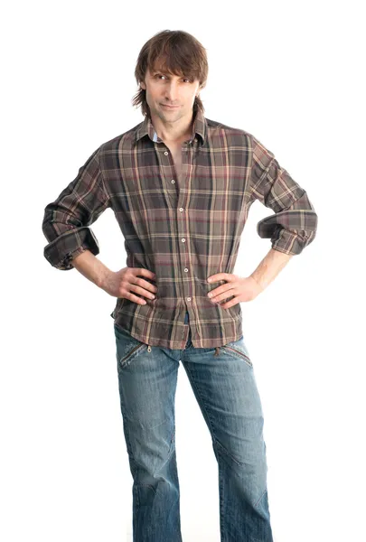 Casual young man in plaid shirt isolated on white background — Stock Photo, Image