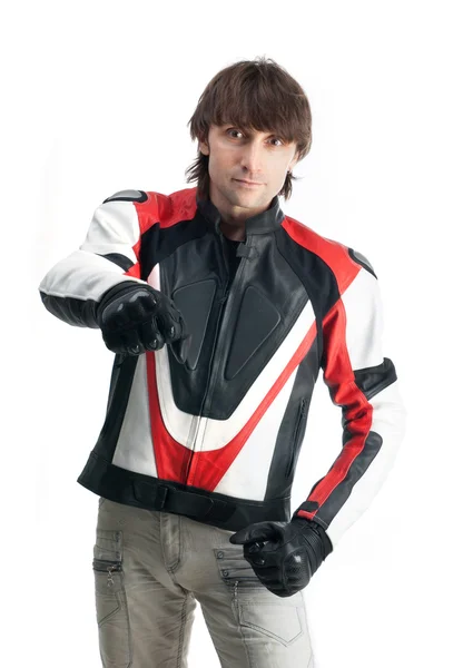 Hombre guapo en chaqueta de motociclista y guantes aislados en fondo blanco — Foto de Stock
