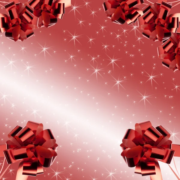 Red bows on on a red background whith white star — Stock Photo, Image