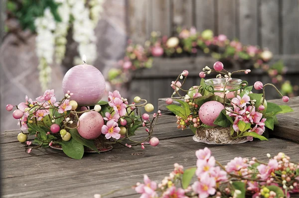 Easter eggs hidden in natural straw nest — Stock Photo, Image