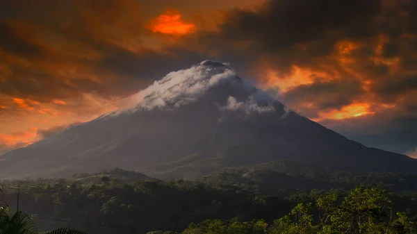 Volcano Arenal in Costa Rica covered with clouds