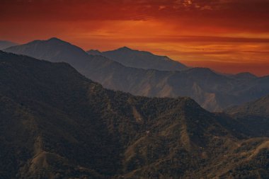 Sunrise over the mountains of the Sierra Nevada de Santa Marta on the way to Lost City clipart