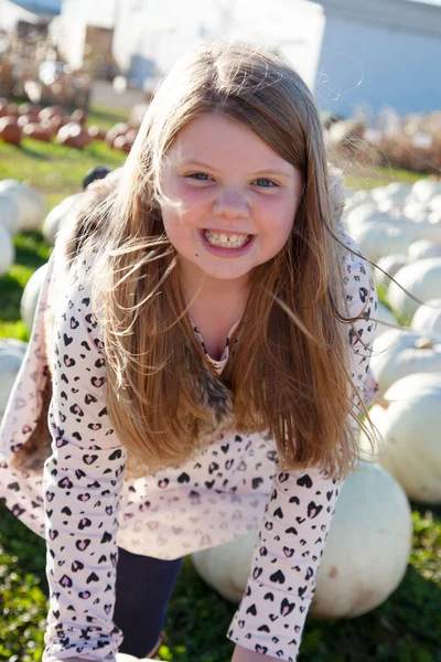 Smiling Girl Field Pumpkins Playing Grinning — Foto de Stock