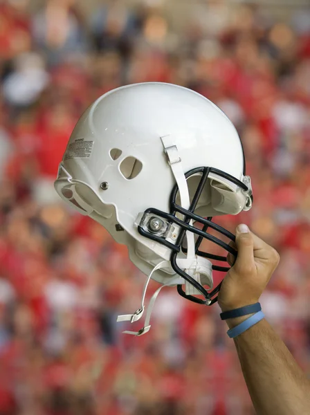 Casco de fútbol levantado — Foto de Stock