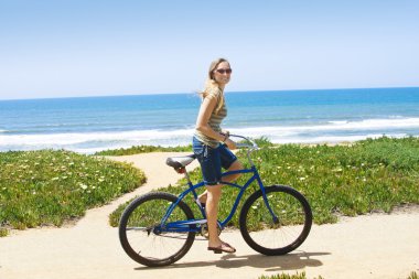 Woman on a Bicycle Ride clipart