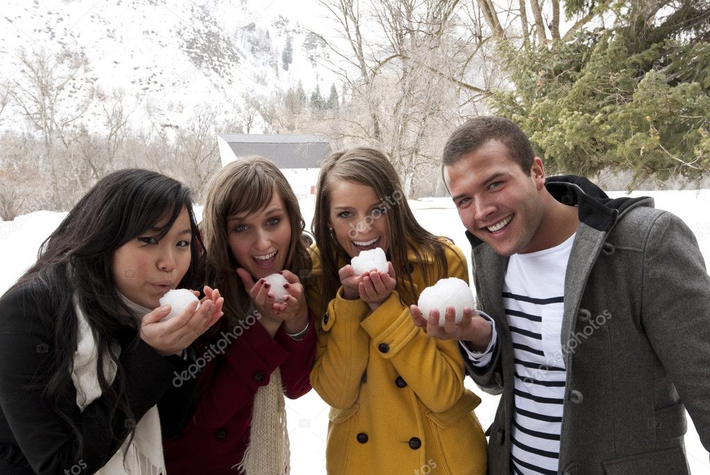 Young Adults ready for a snowball fight