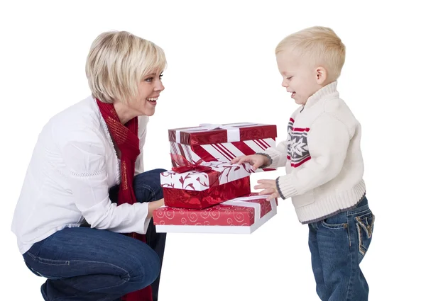 Mother Giving Christmas Presents to her Child — Stock Photo, Image