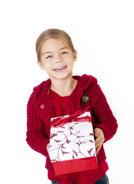 Noel hediyesi ile küçük kız — Stok fotoğraf