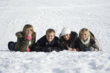 Young adults in the Snow clipart
