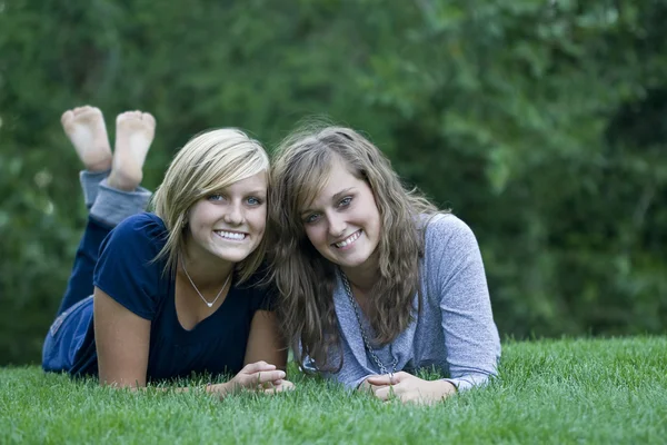 Young women on the grass — Stock Photo, Image