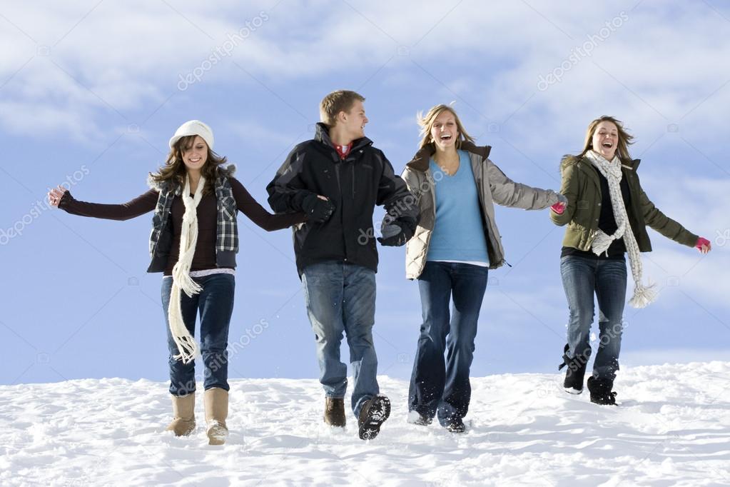 Young people having fun in the snow