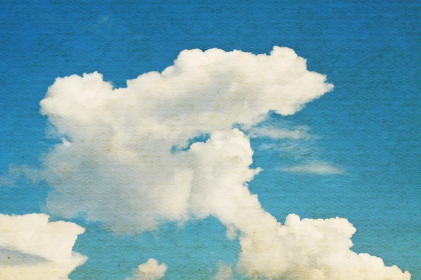 Sky and clouds on grunge paper texture — Stock Photo, Image