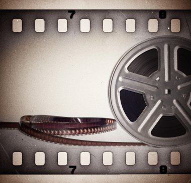 Eski sinema filmi makara film şeridi ile. antika arka plan