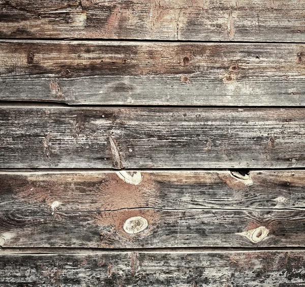 Oude donkere houten muur achtergrond — Stockfoto
